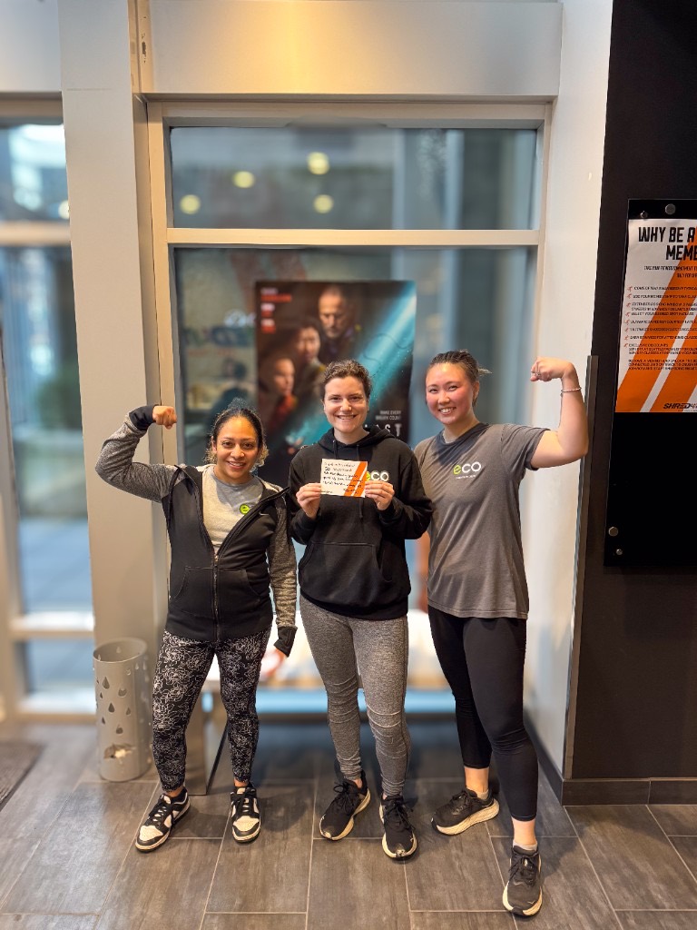 Eco team members celebrating a coworker milestone
