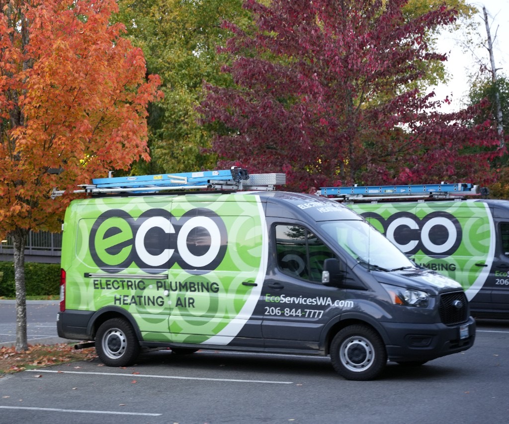 A freshly wrapped Eco Electric, Plumbing, Heating & Air box truck