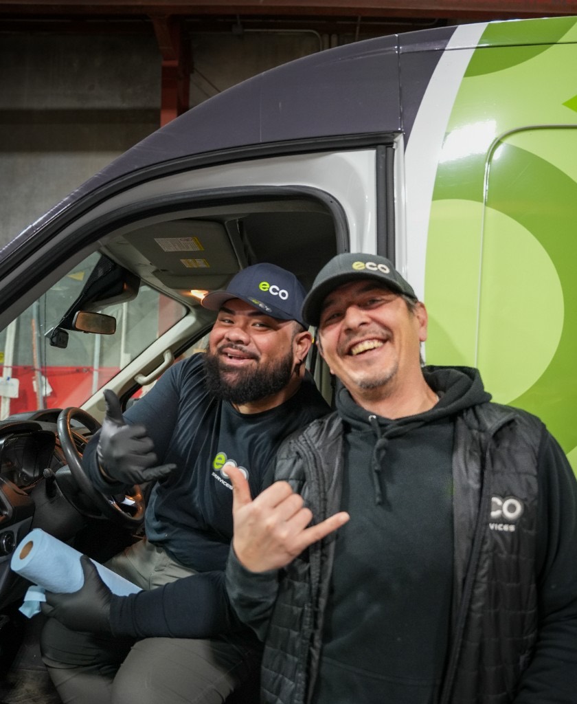 Eco plumbers with a water heater on a Seattle-area job