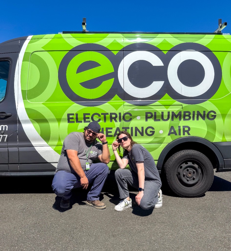 Two Eco Electric, Plumbing, Heating & Air team members at the office
