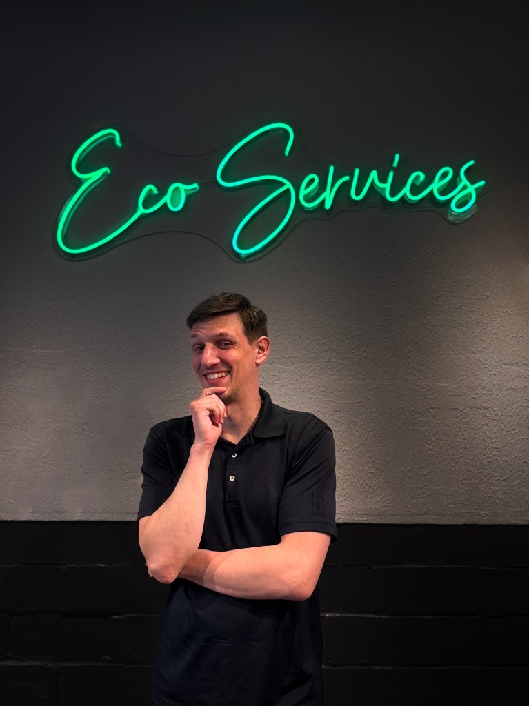 An Eco Electric, Plumbing, Heating & Air team member at the office