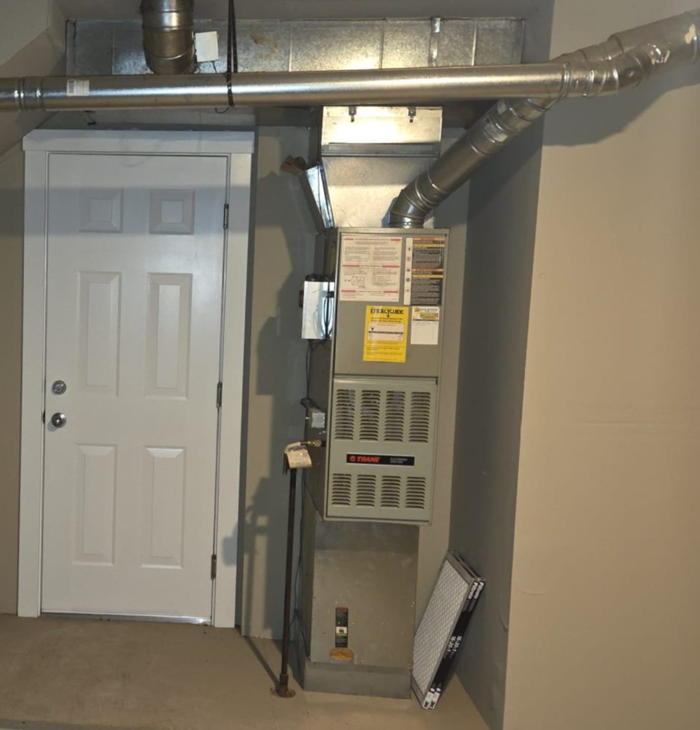 Kirkland townhouse mechanical area before Eco's HVAC and plumbing work