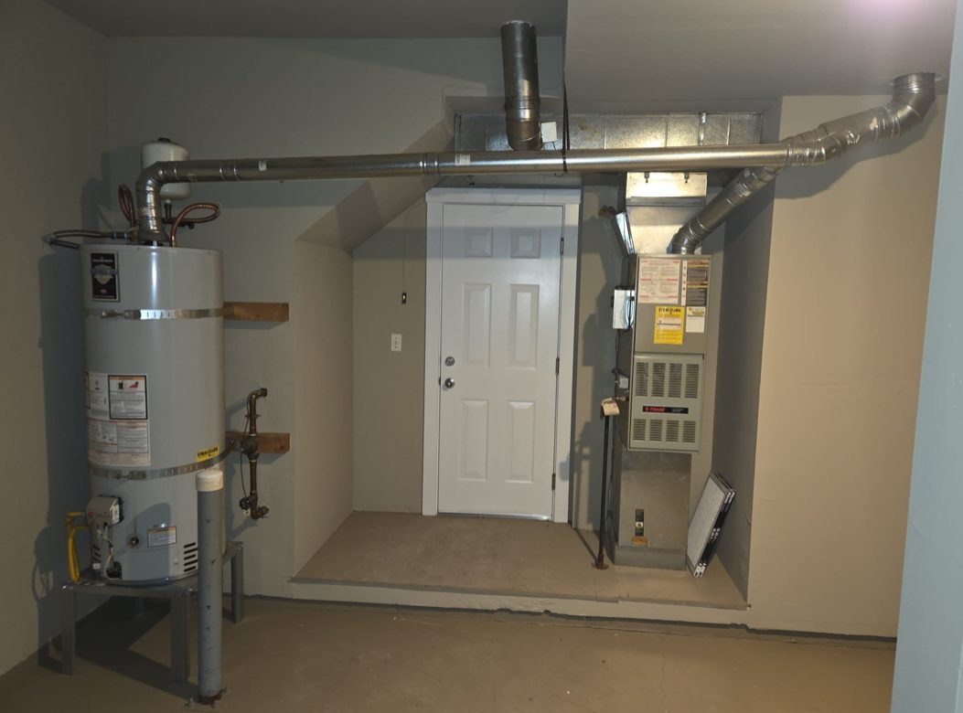 New Trane furnace installed in the Kirkland townhouse mechanical closet