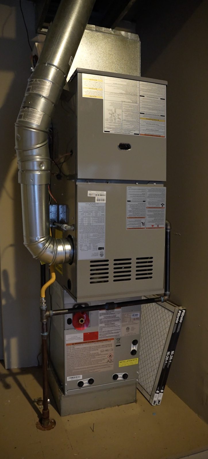 Completed furnace and venting installation in the Kirkland townhouse