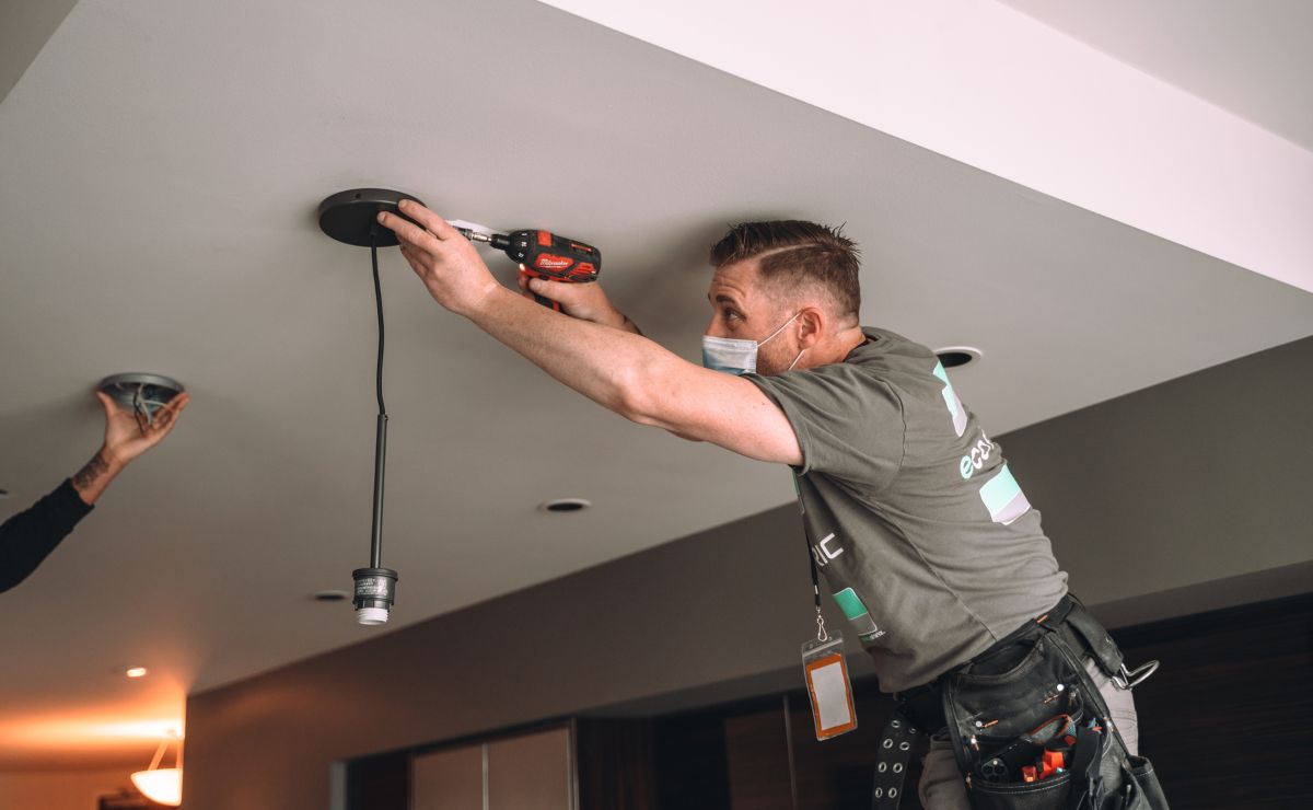 Image of an Eco Electric and Plumbing employee providing electrical repair in Everett, Washington